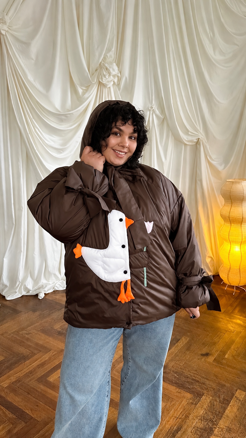 Down jacket "Little duck" in chocolate with detachable bows and removable hood