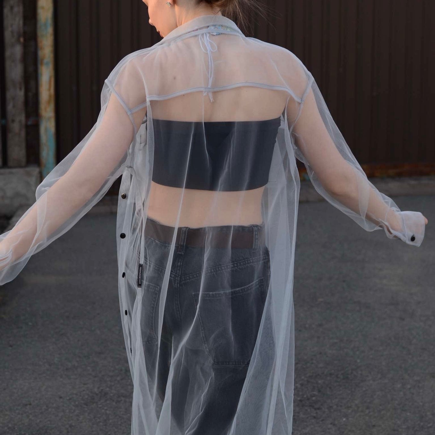 Elongated transparent gray shirt