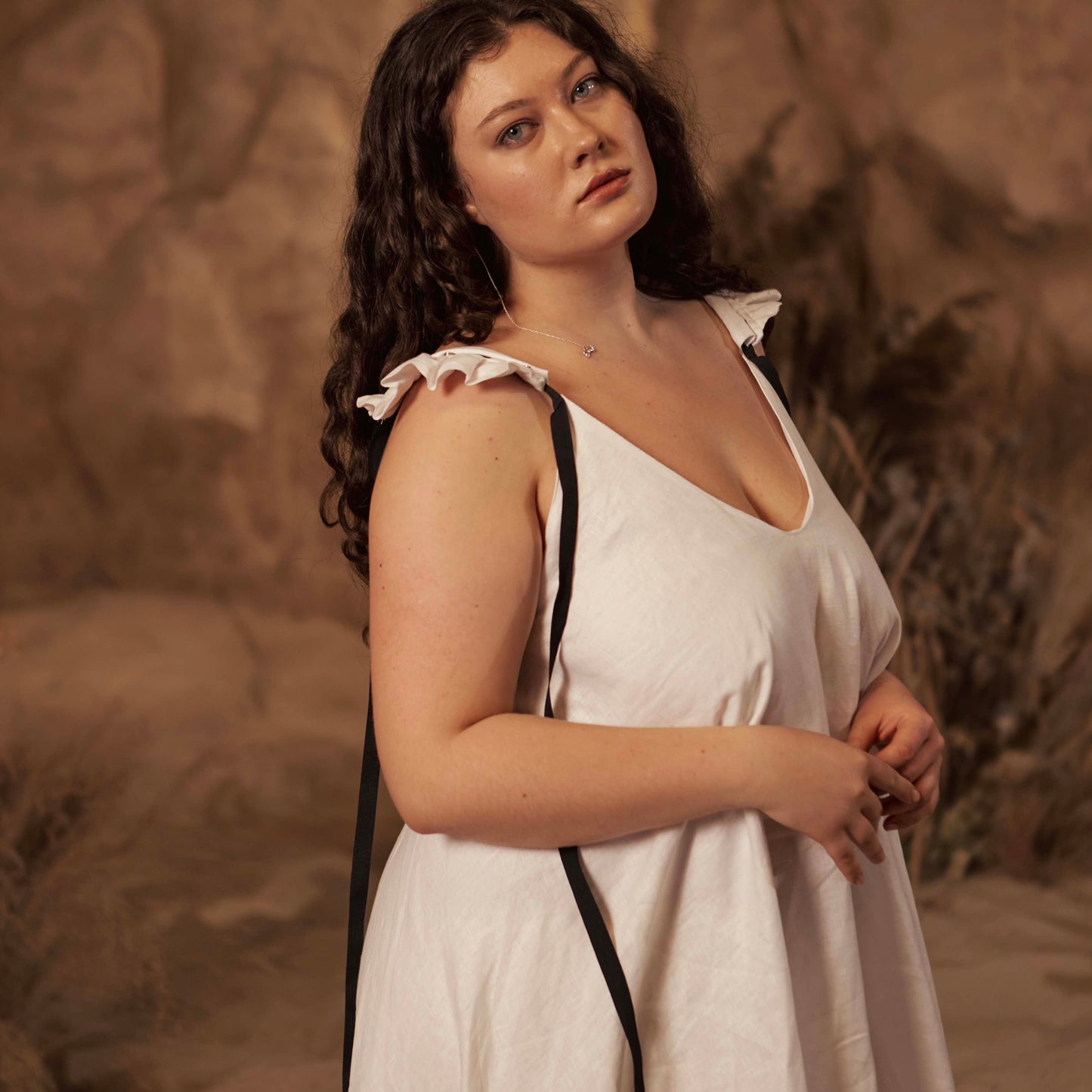 Dress with ribbons in organic linen