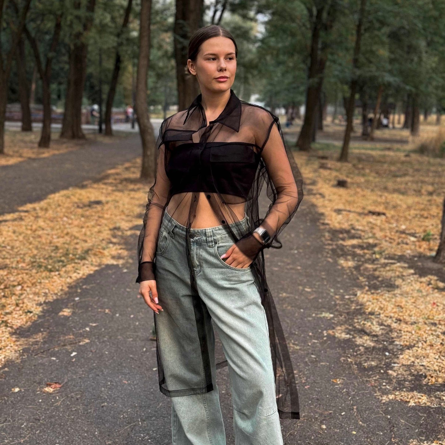Elongated transparent black shirt