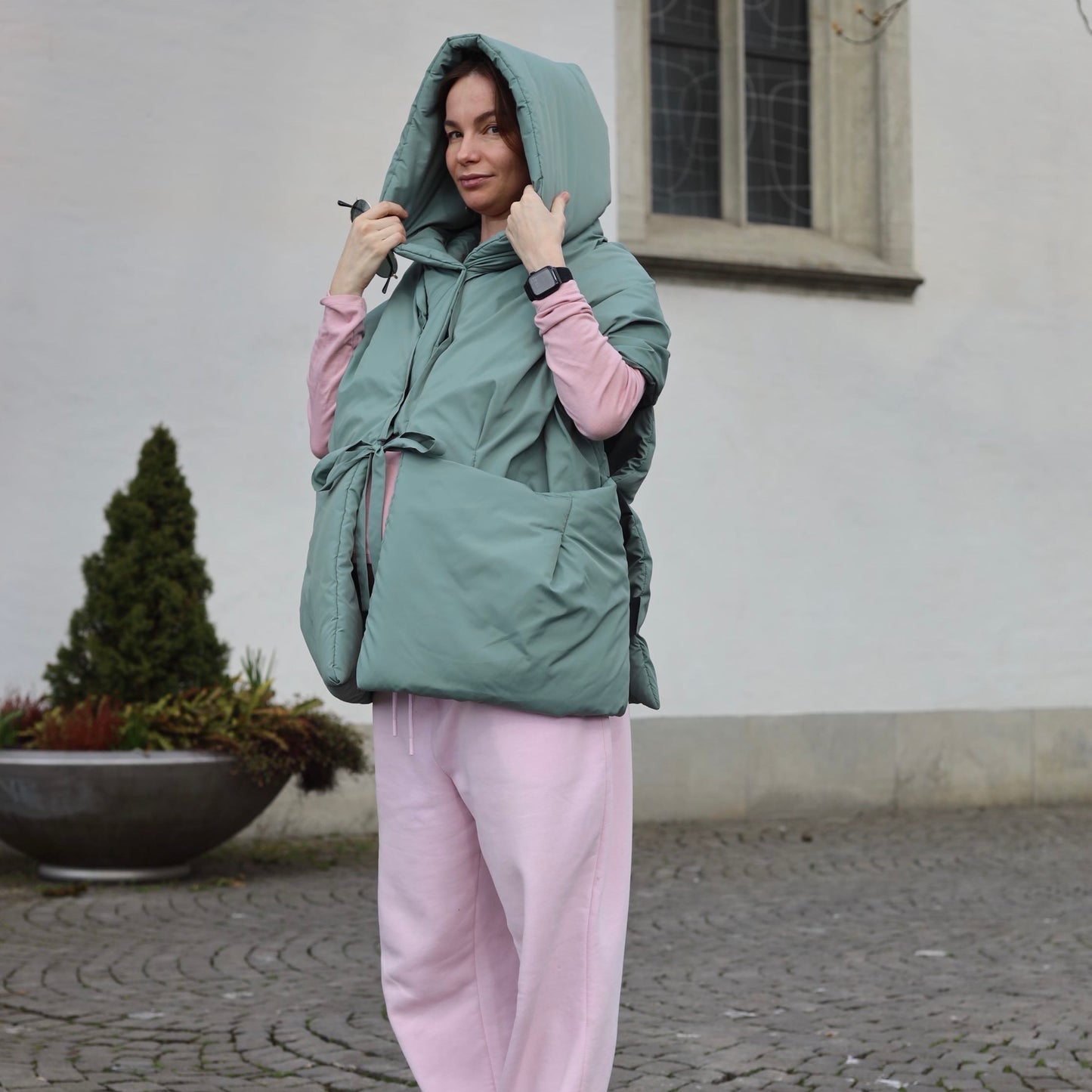 <tc>Жилетка кольору нефрит з відстібним капюшоном</tc>