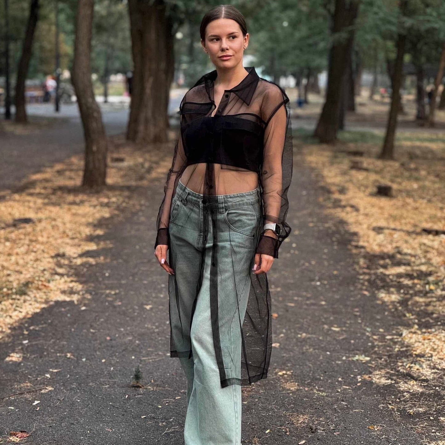 Elongated transparent black shirt