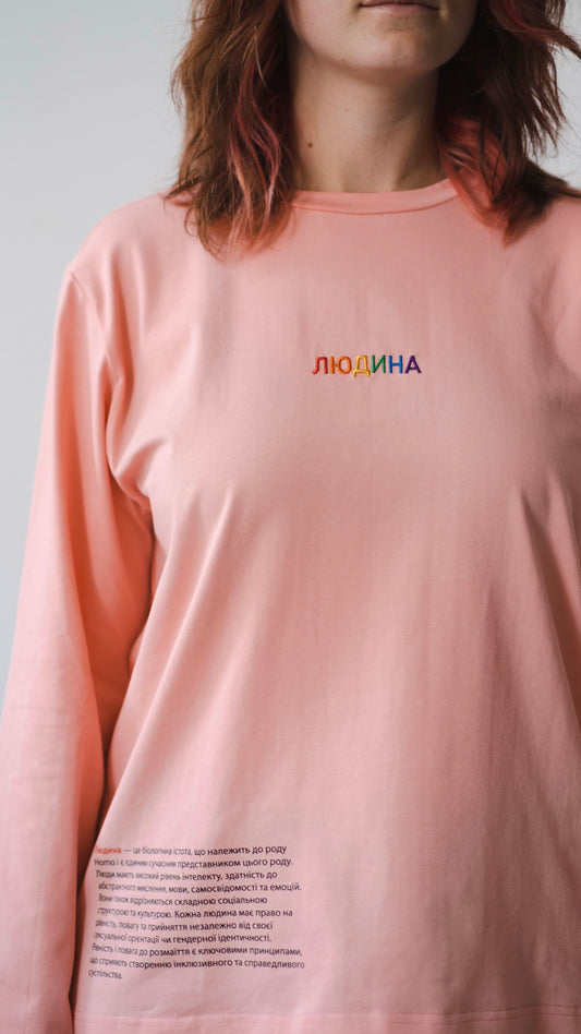 Longsleeve with a symbolic inscription «Human» peach