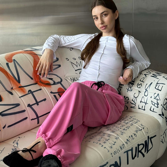 Рожеві спортивні штани з трикотажу