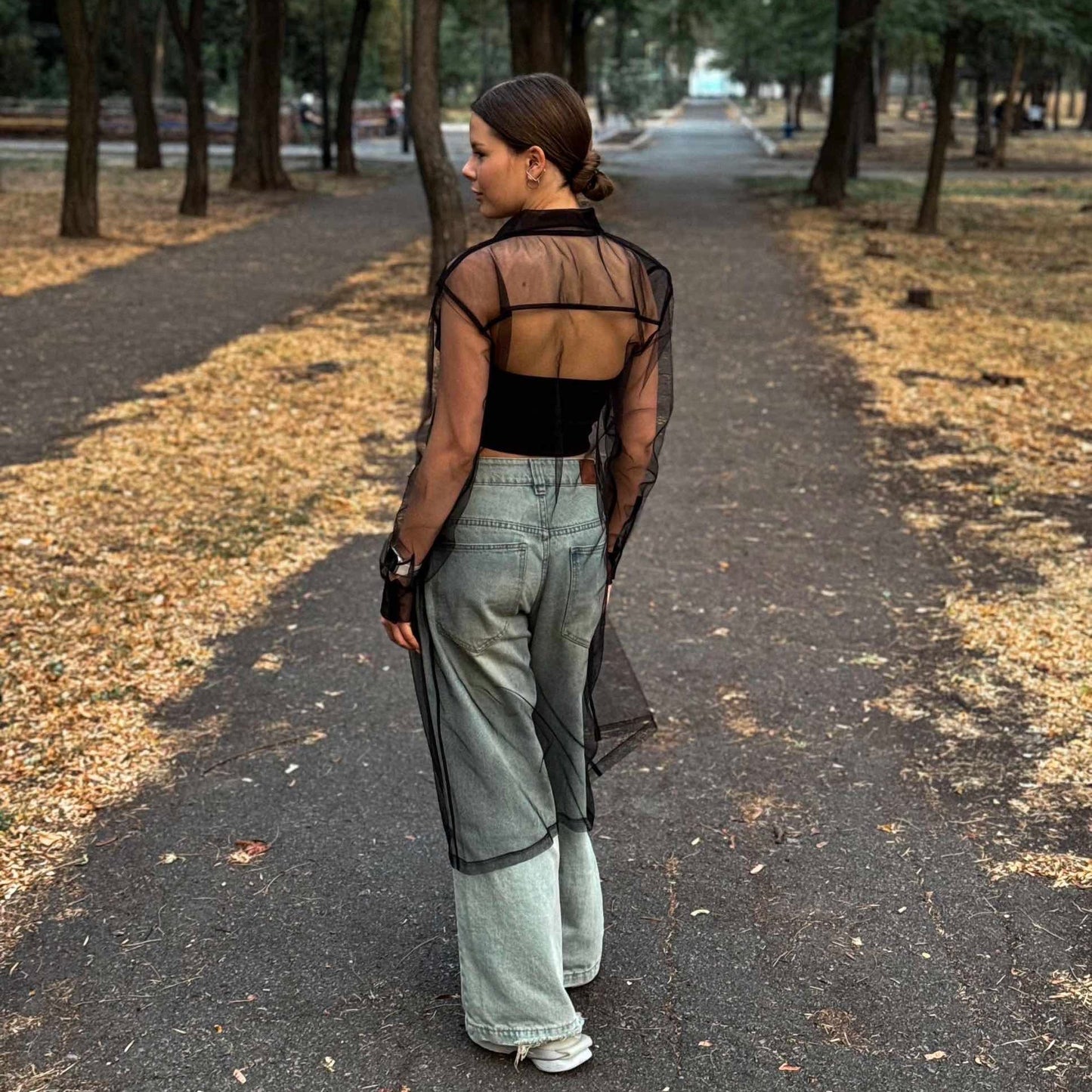 Elongated transparent black shirt