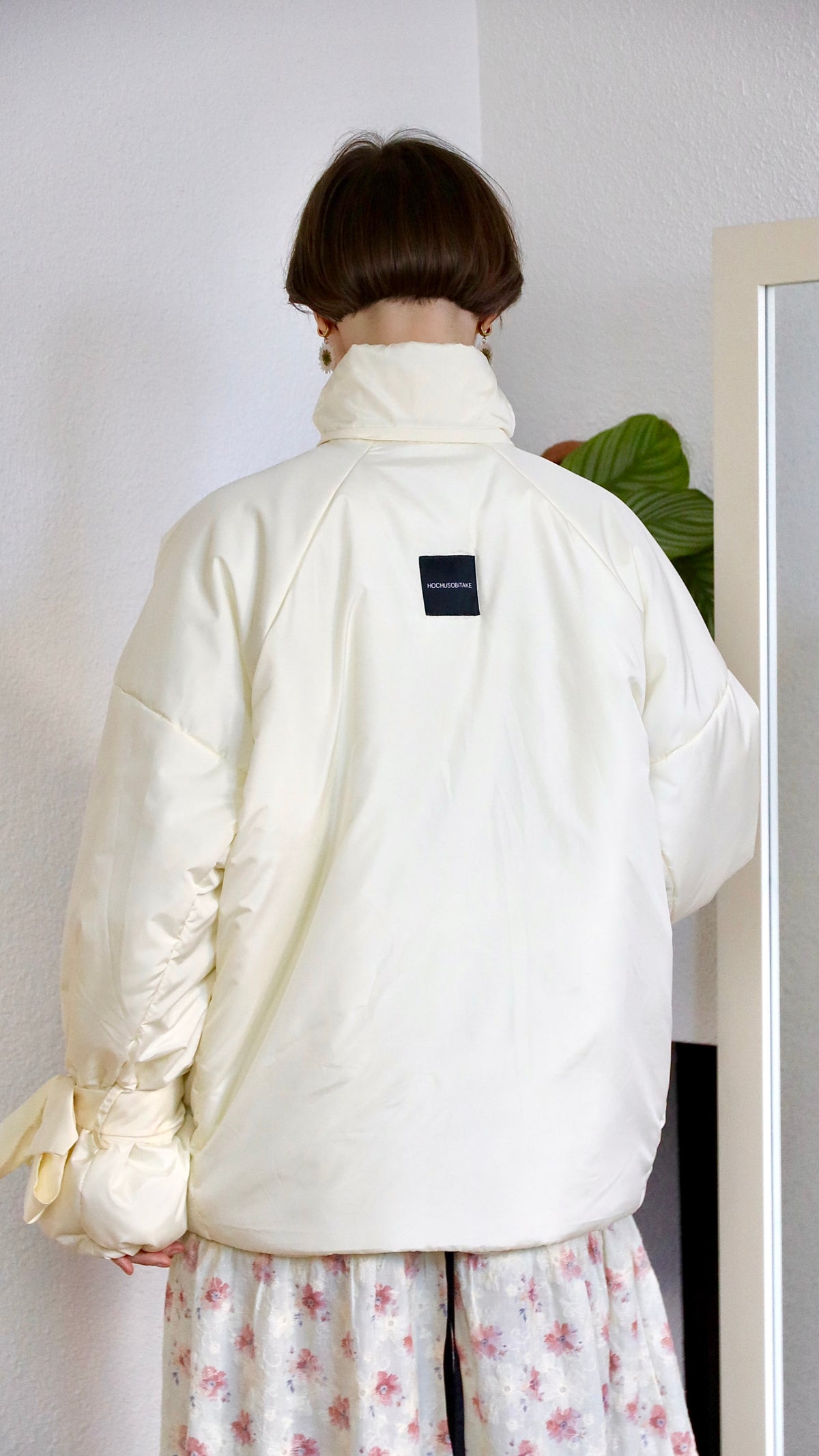 Down jacket in yellow butter with detachable powder and removable hood