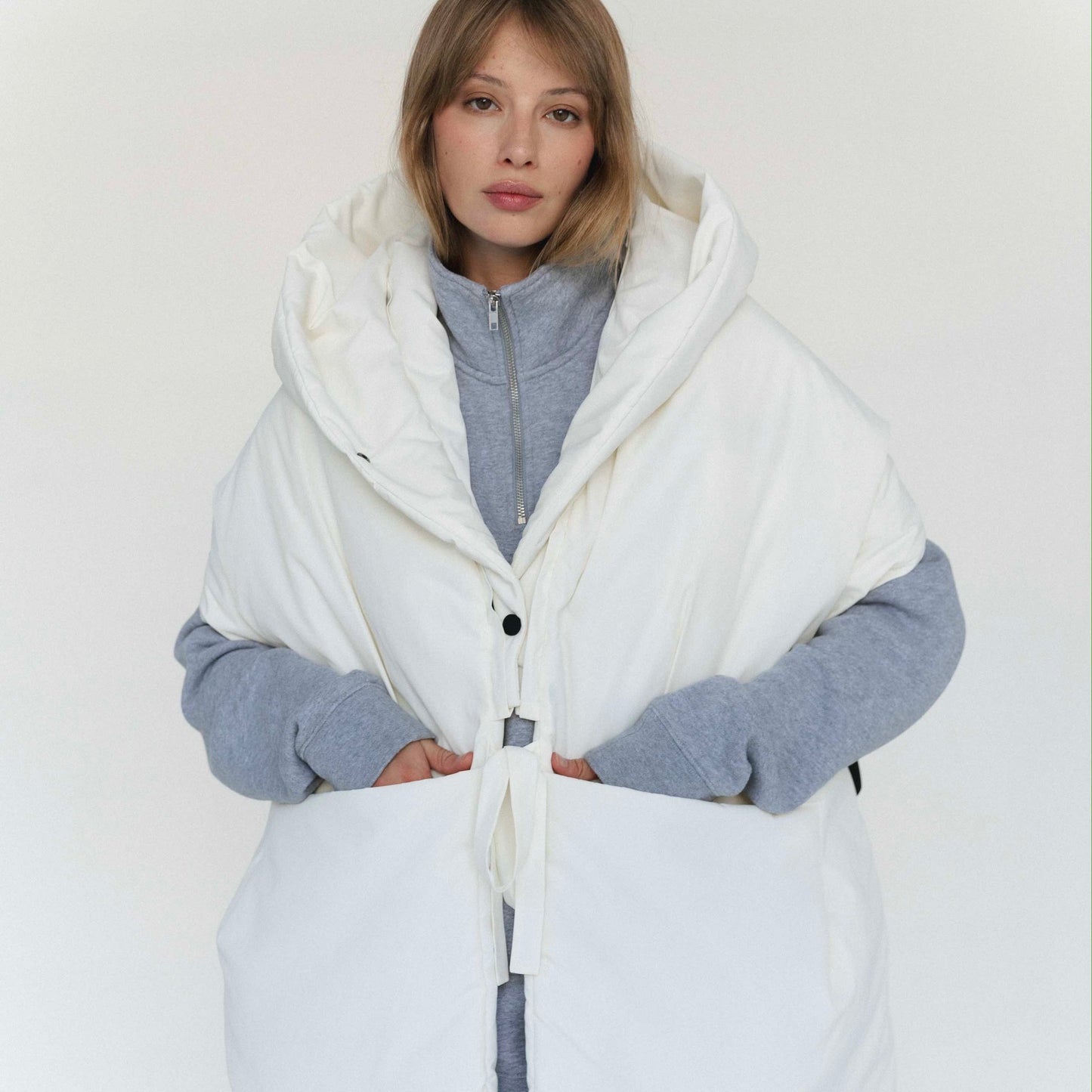 Milk Down vest with detachable hood