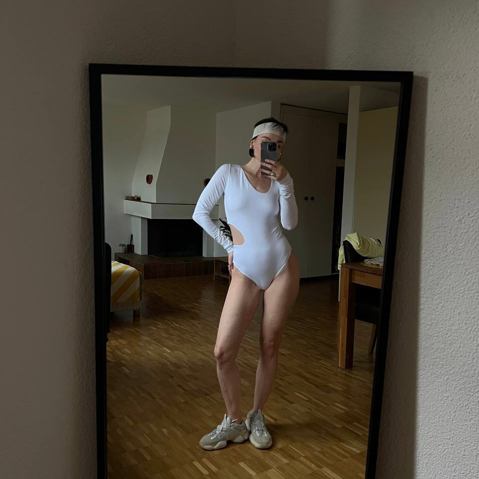 Body with asymmetric cutout