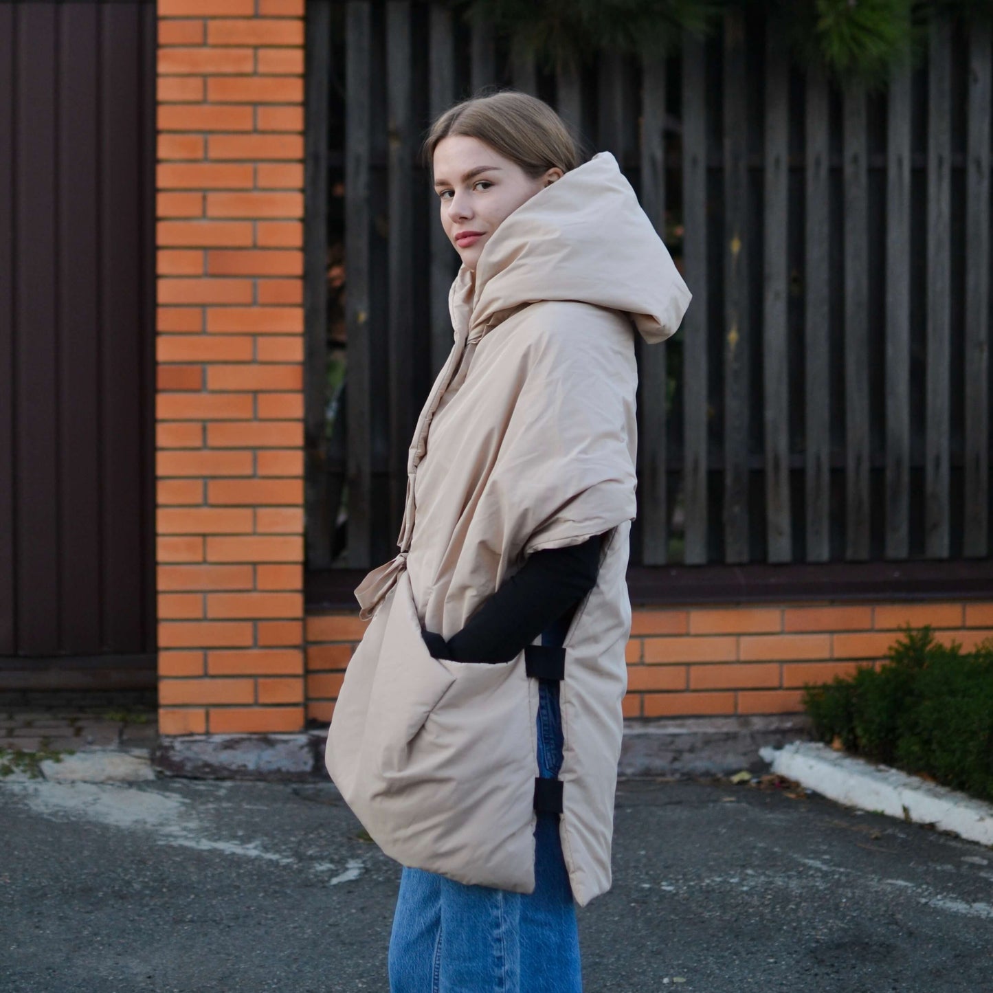 Beige Down vest with detachable hood