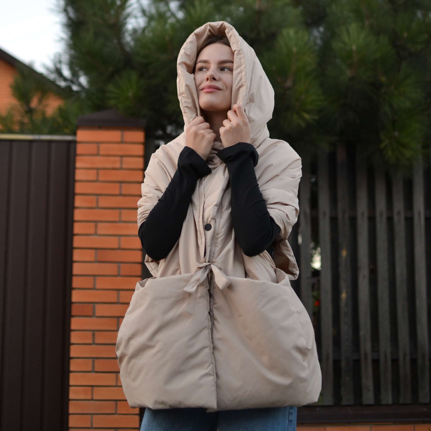 Beige Down vest with detachable hood