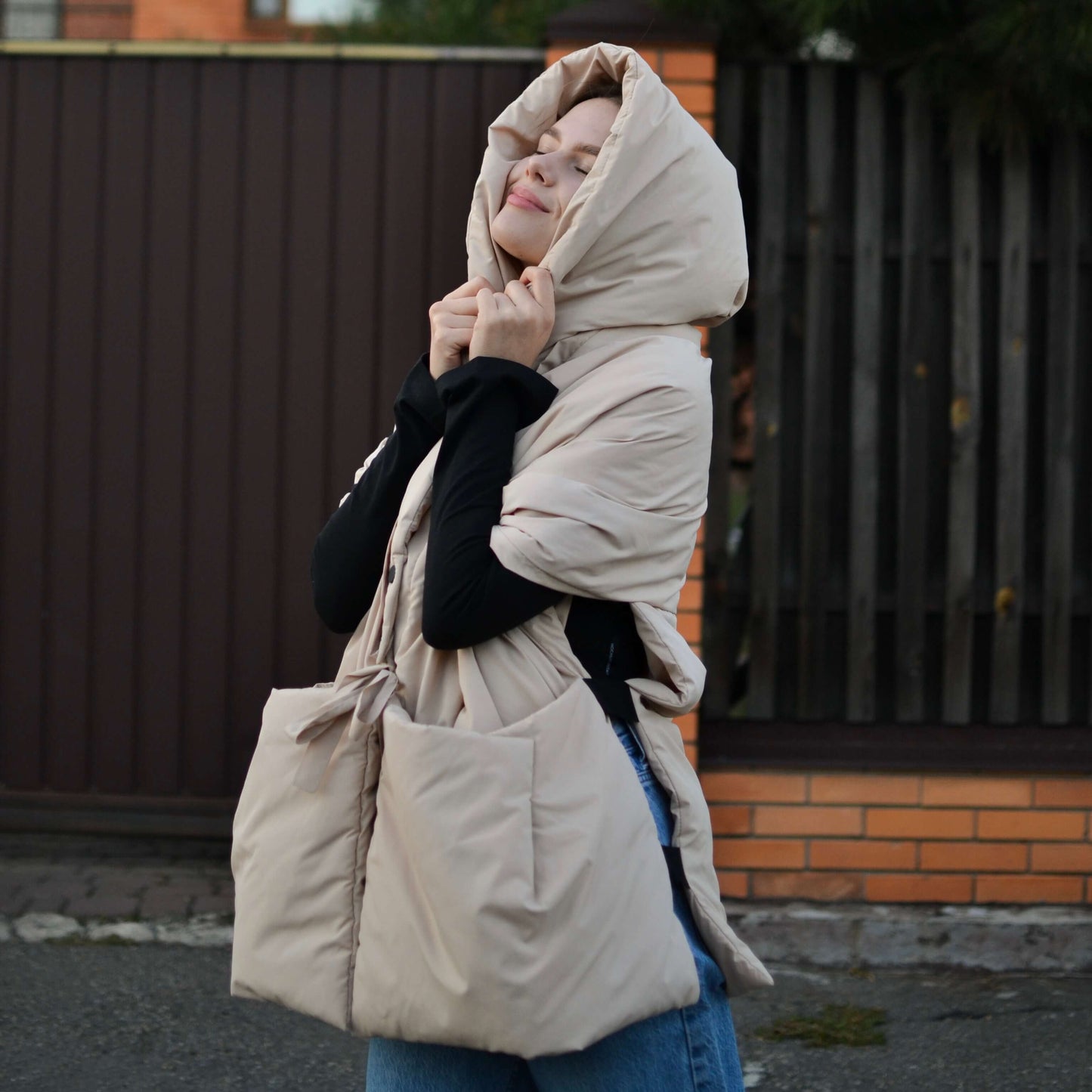 Beige Down vest with detachable hood