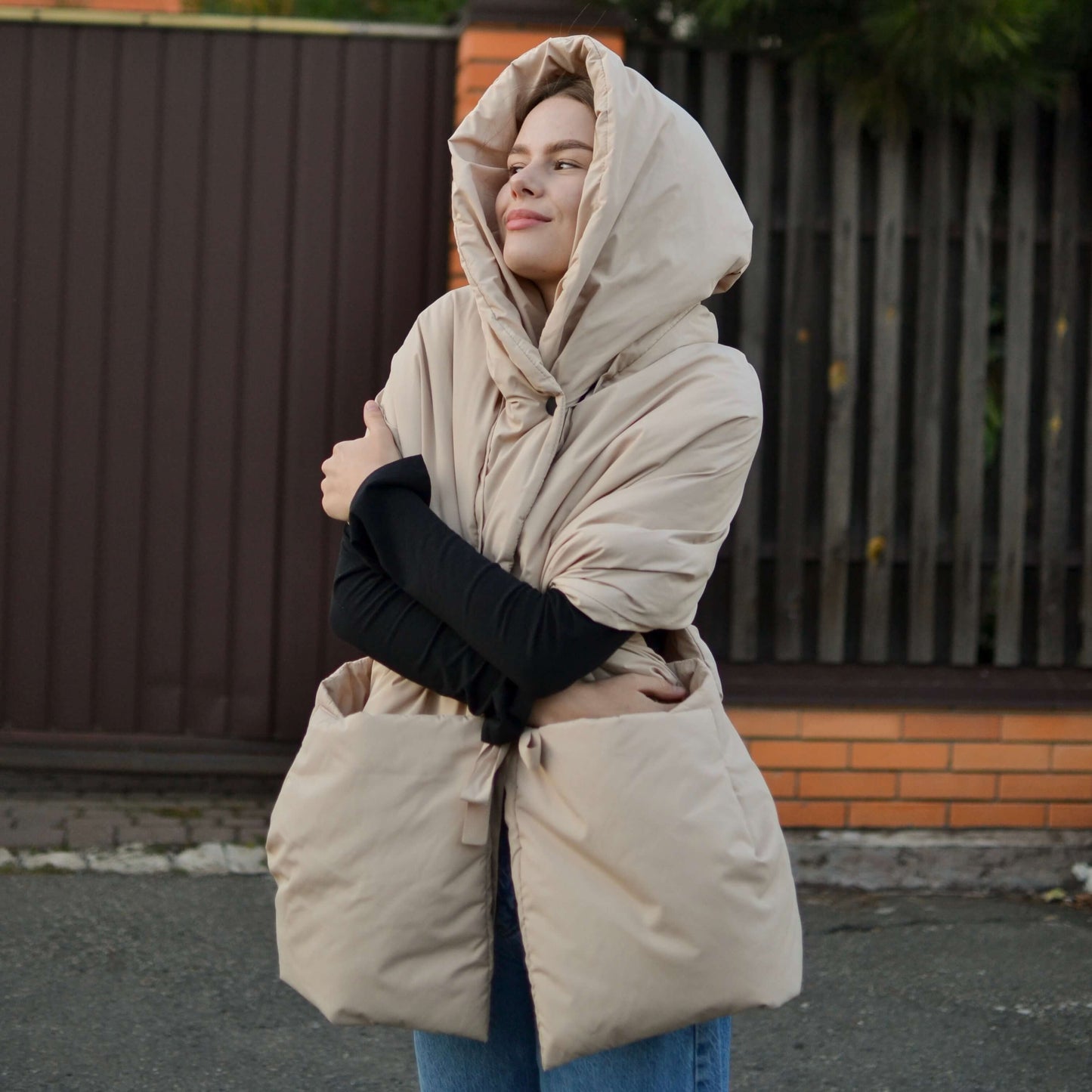 Beige Down vest with detachable hood
