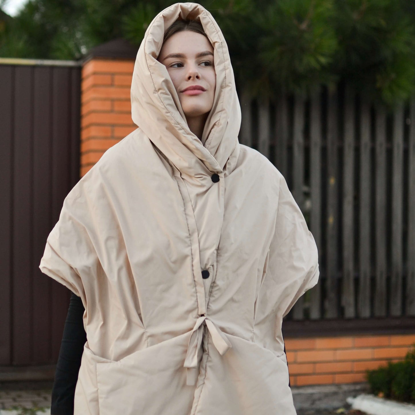 Beige Down vest with detachable hood