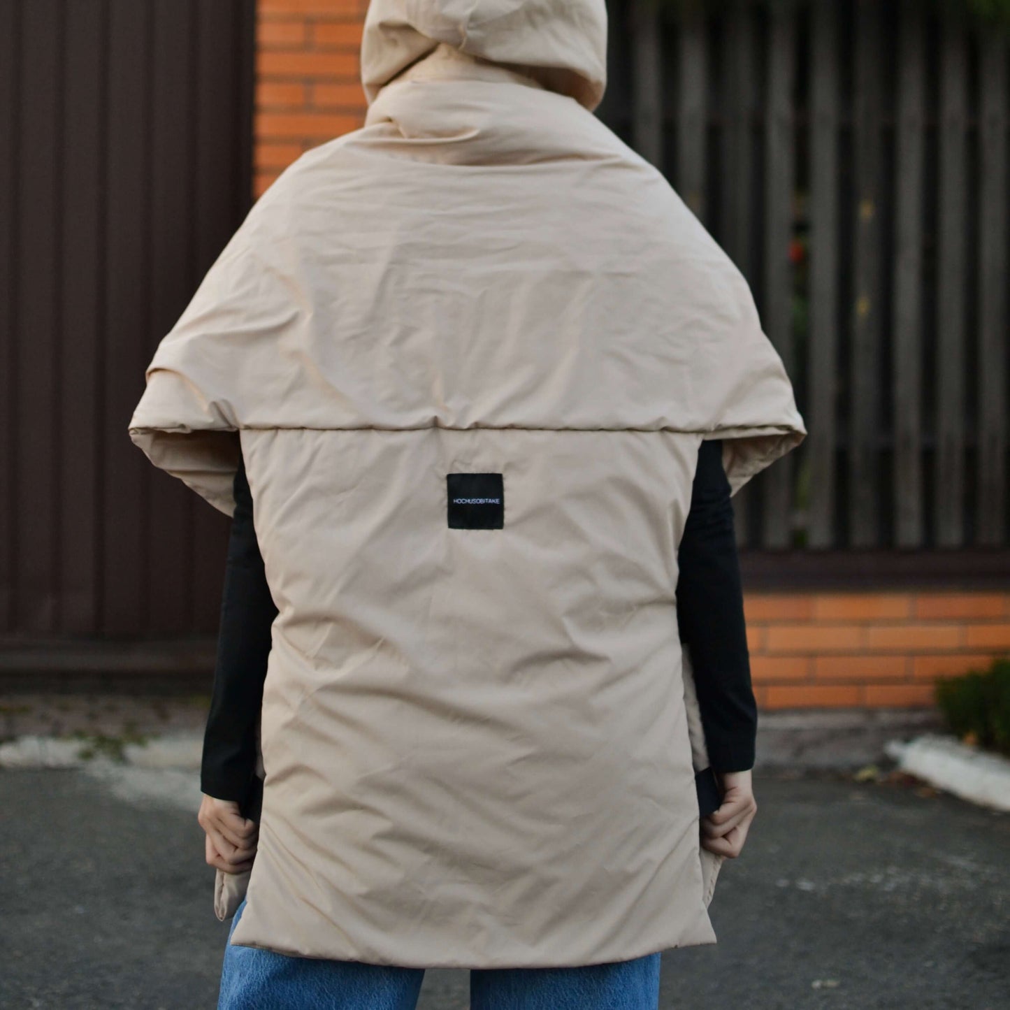 Beige Down vest with detachable hood