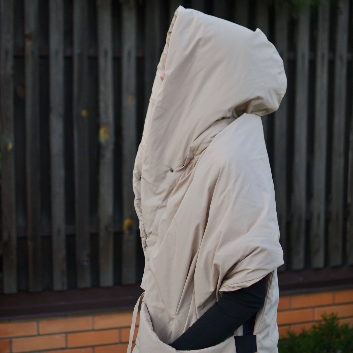 Beige Down vest with detachable hood