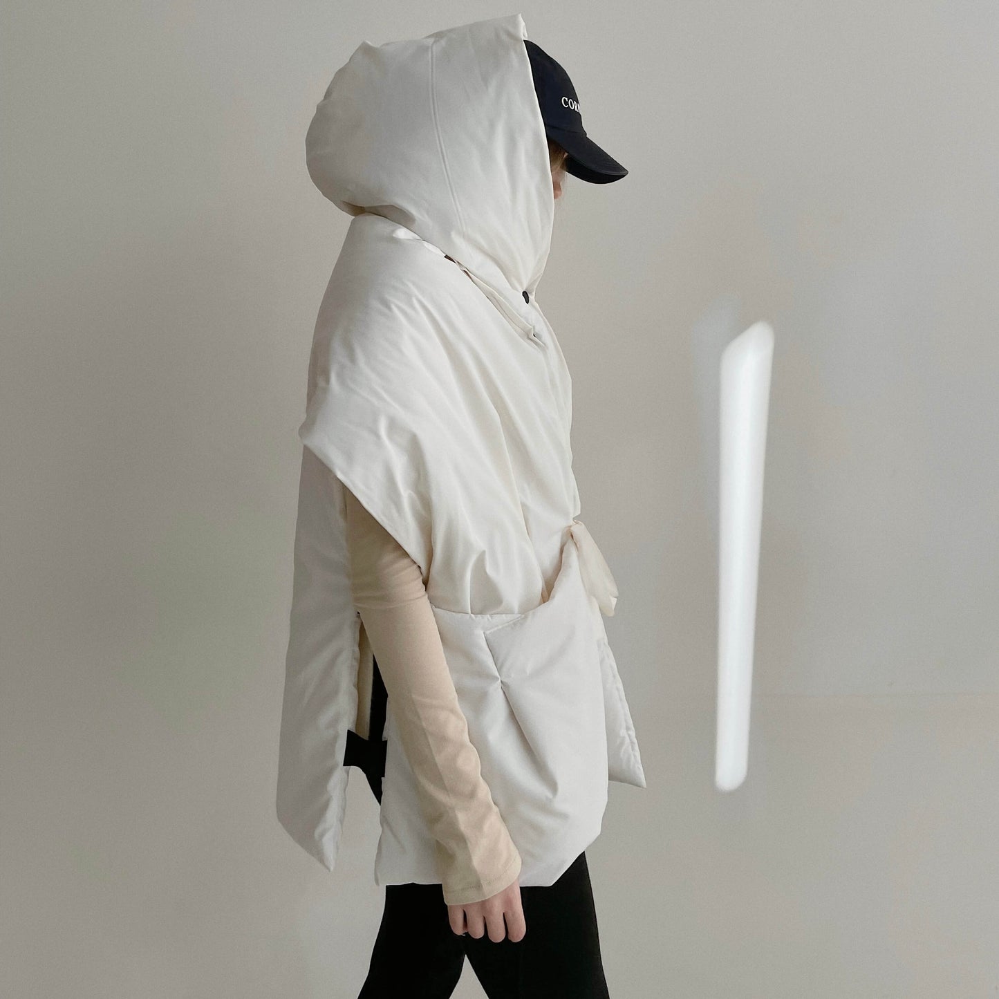 Milk Down vest with detachable hood
