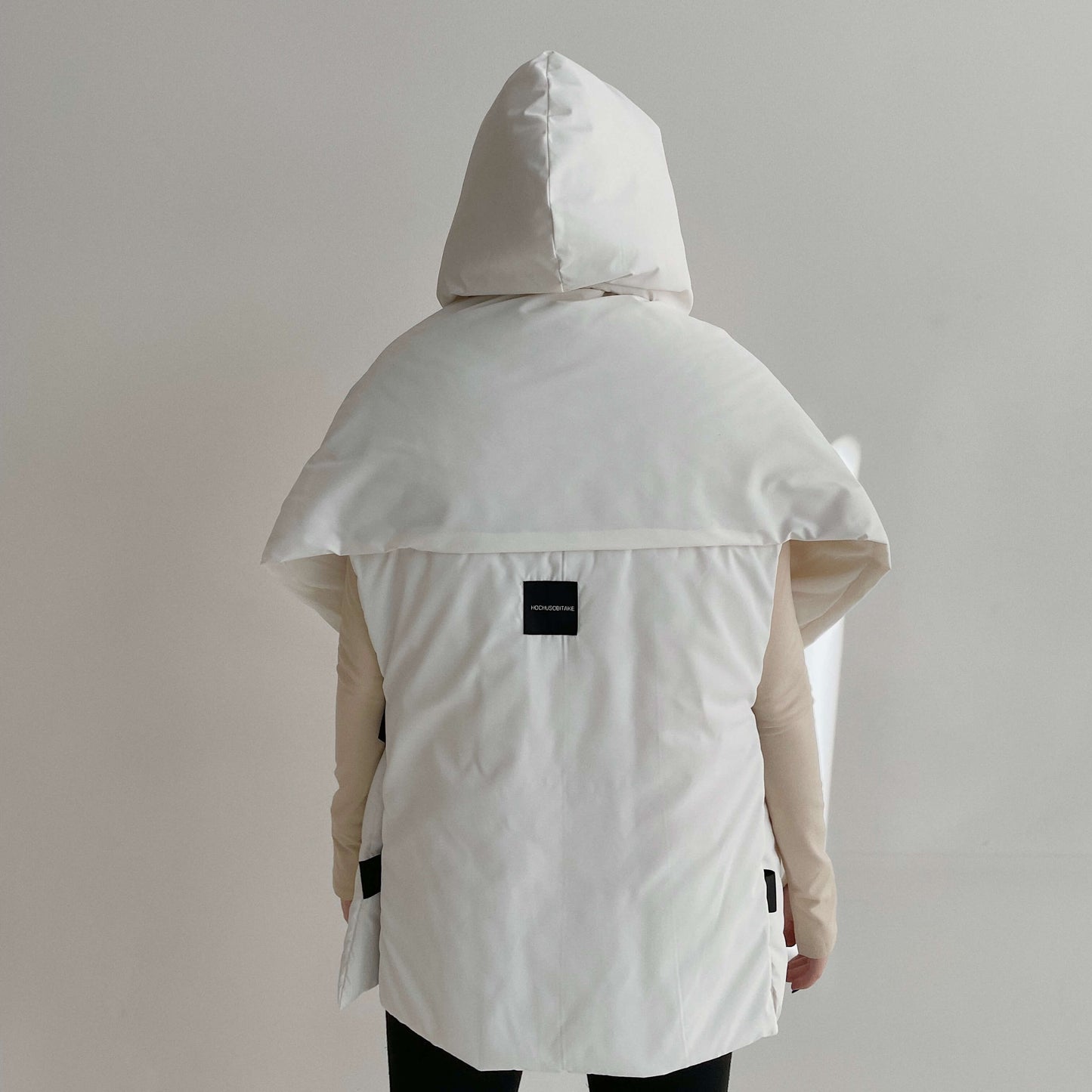 Milk Down vest with detachable hood