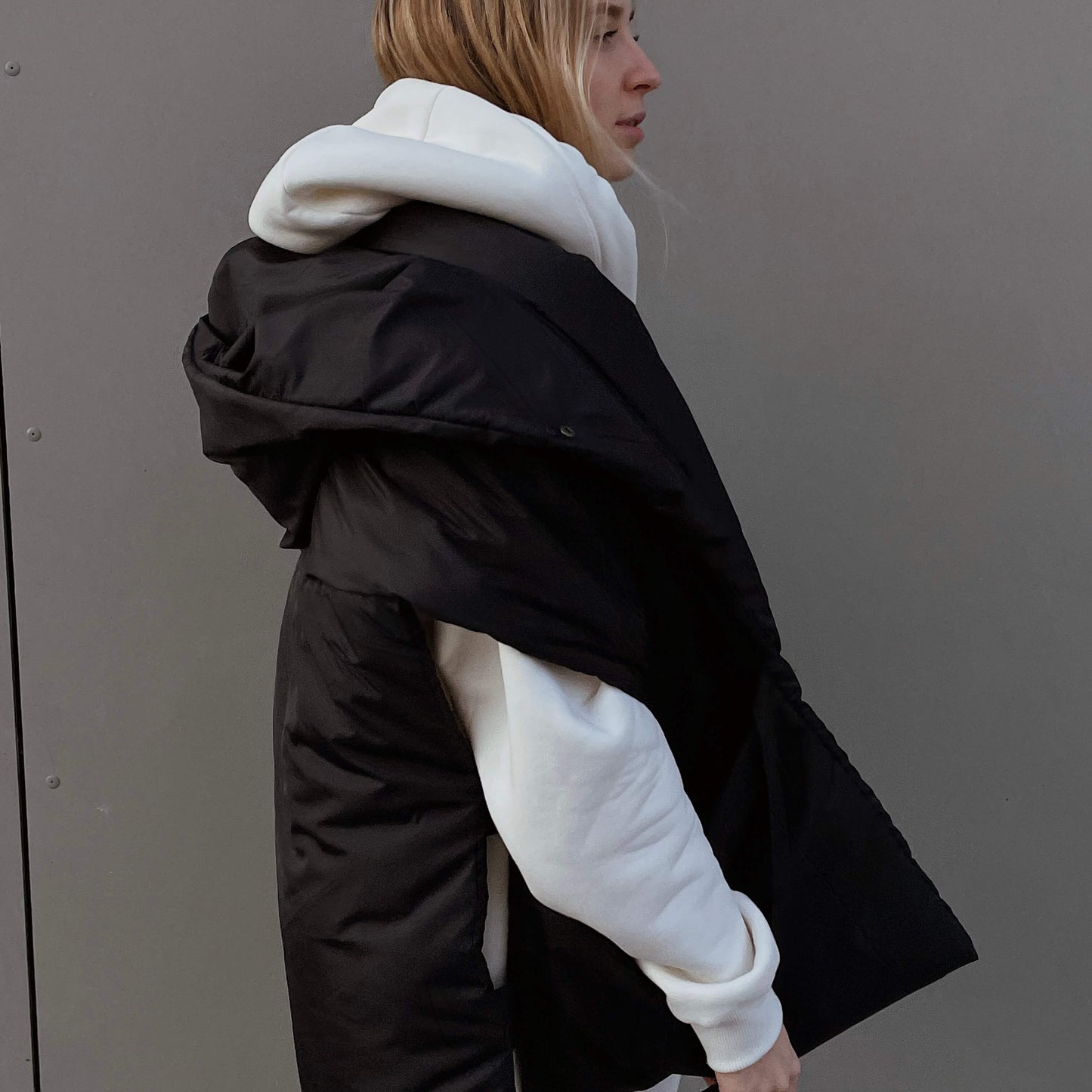 Black Down vest with detachable hood
