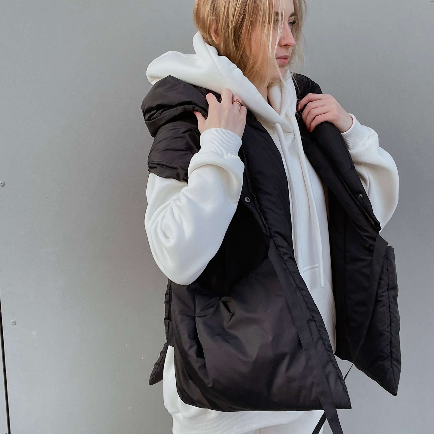 Black Down vest with detachable hood