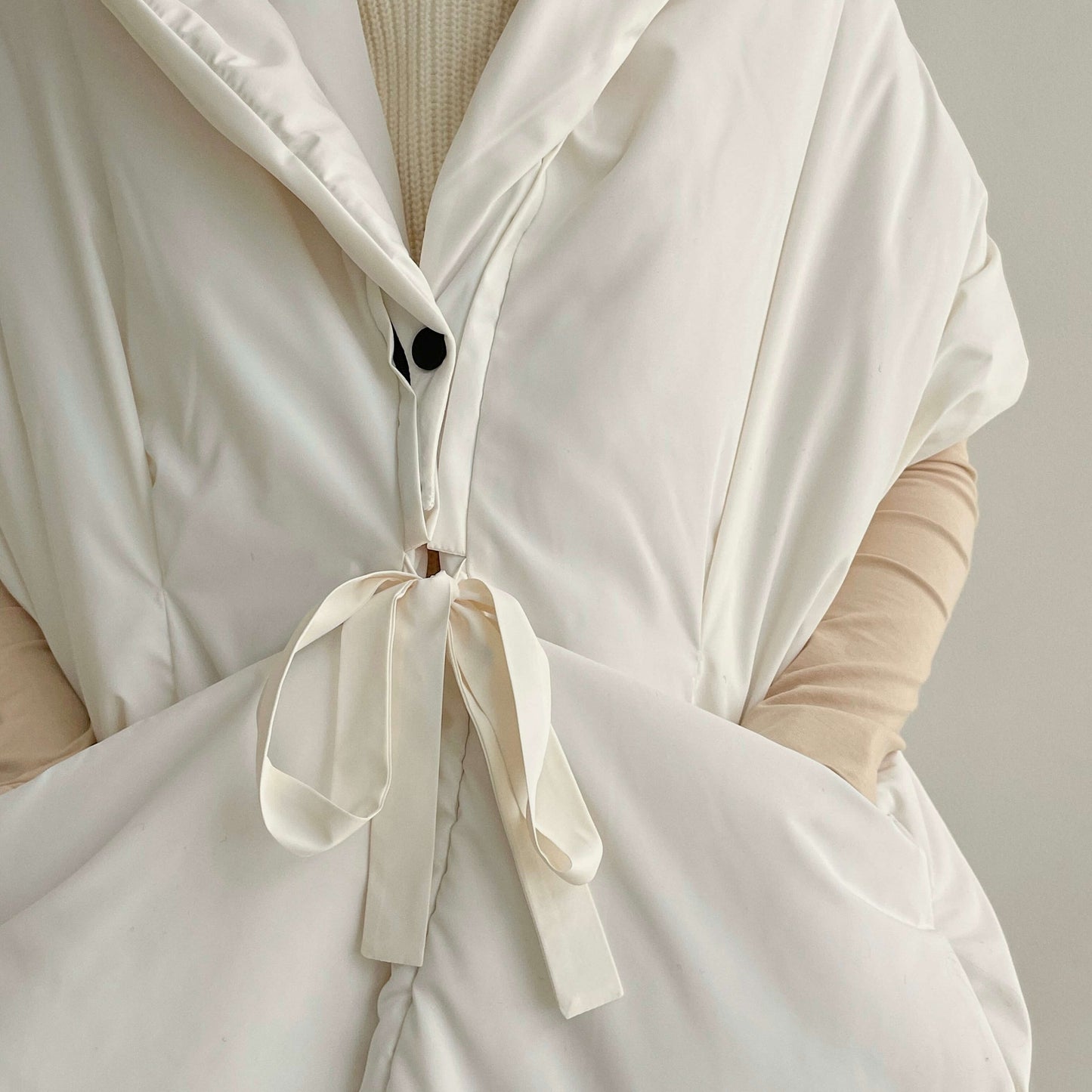 Milk Down vest with detachable hood