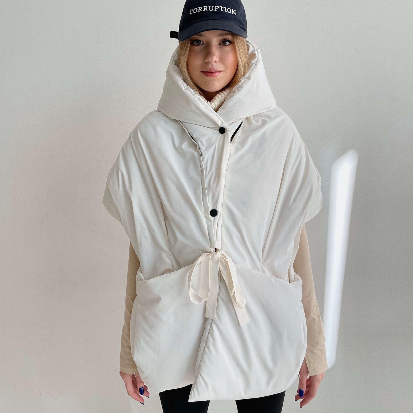 Milk Down vest with detachable hood