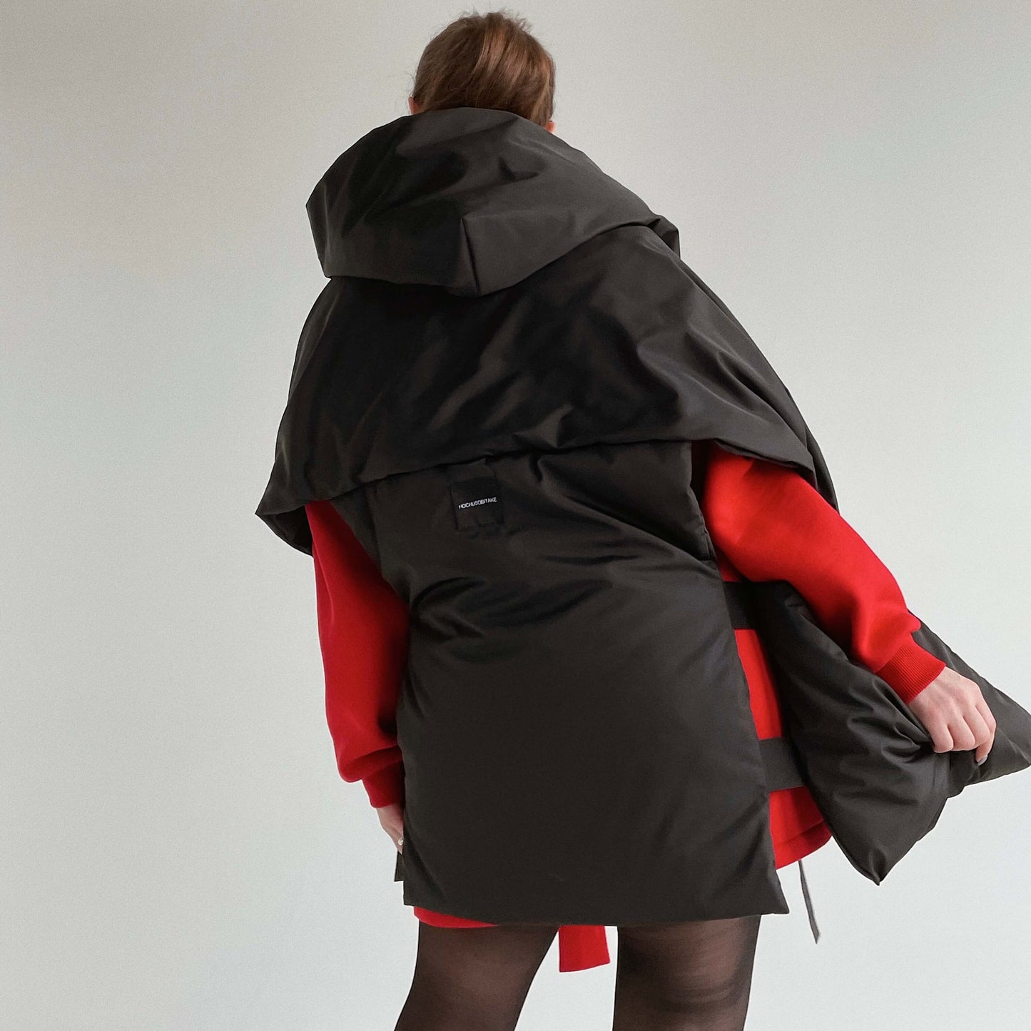 Black Down vest with detachable hood