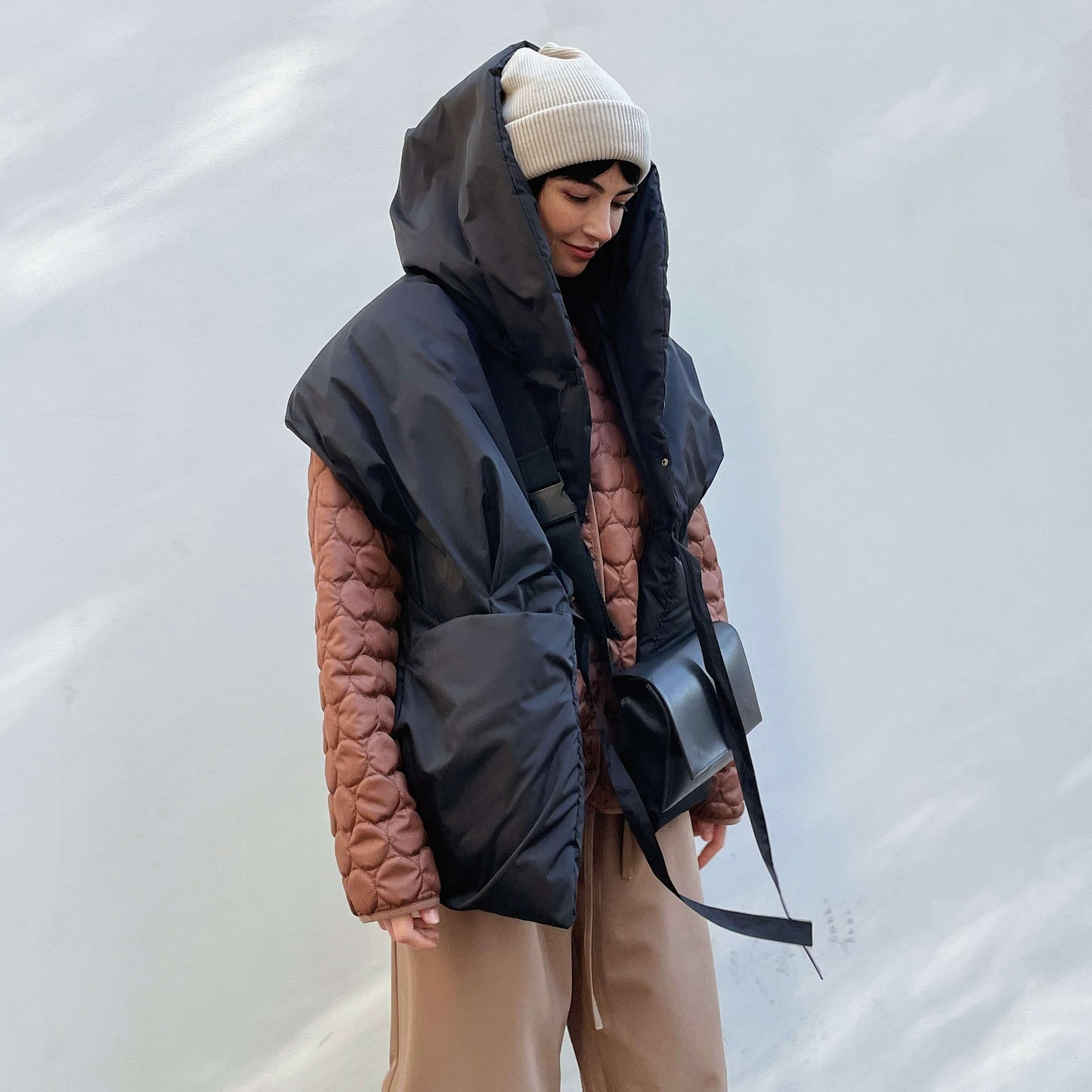 Black Down vest with detachable hood