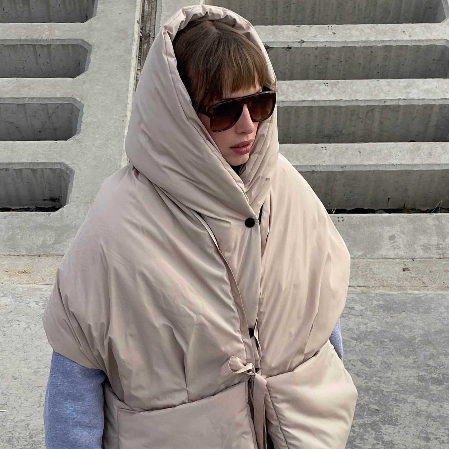 Beige Down vest with detachable hood