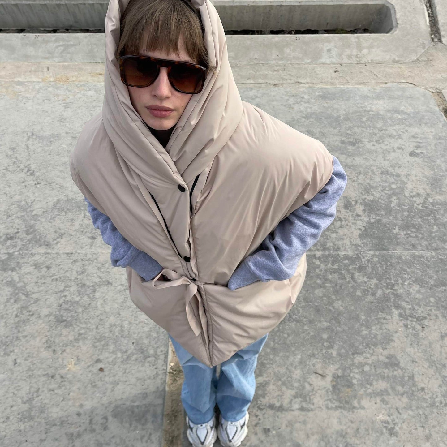 Beige Down vest with detachable hood