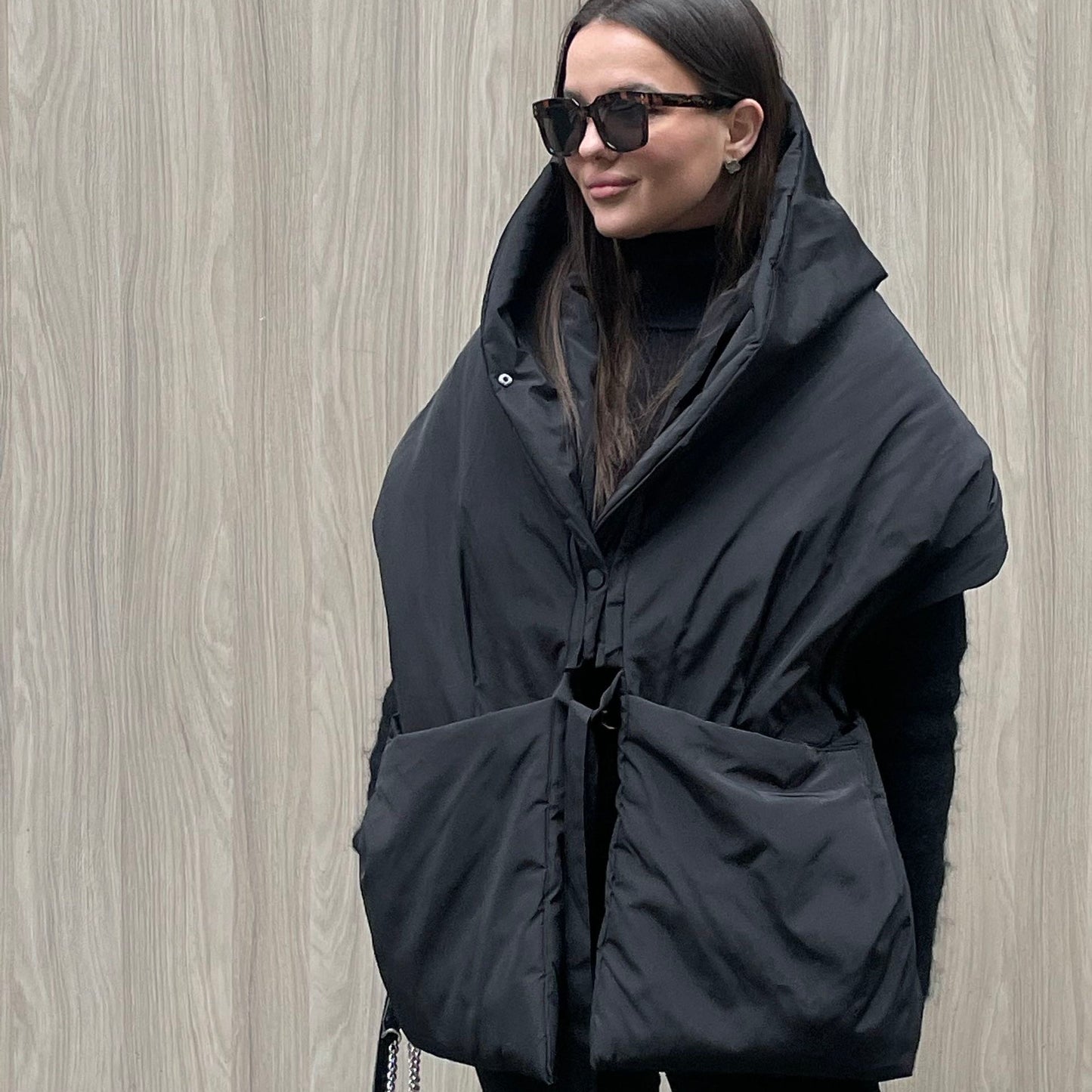 Black Down vest with detachable hood