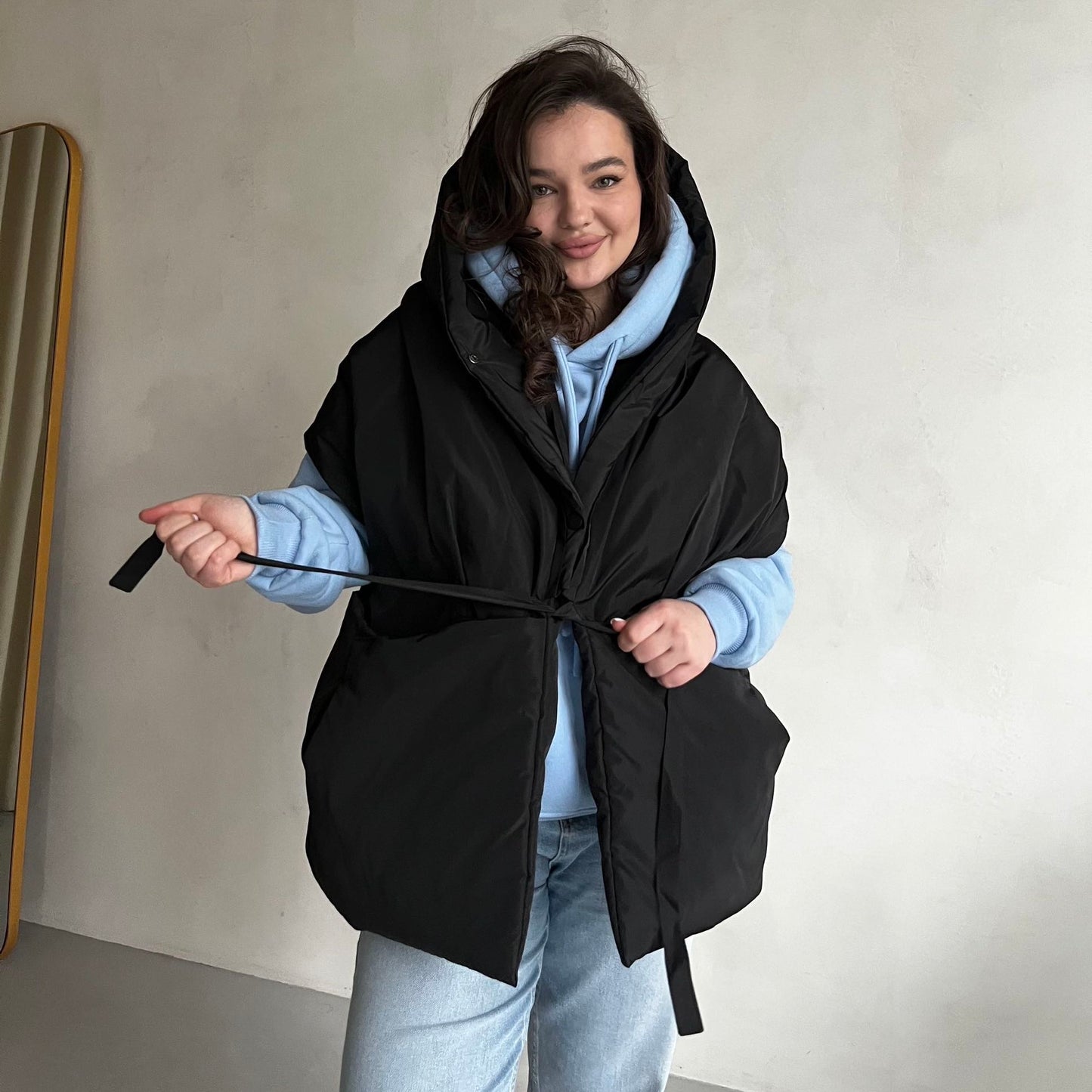 Black Down vest with detachable hood