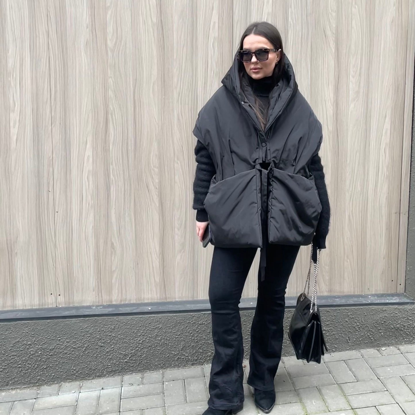 Black Down vest with detachable hood