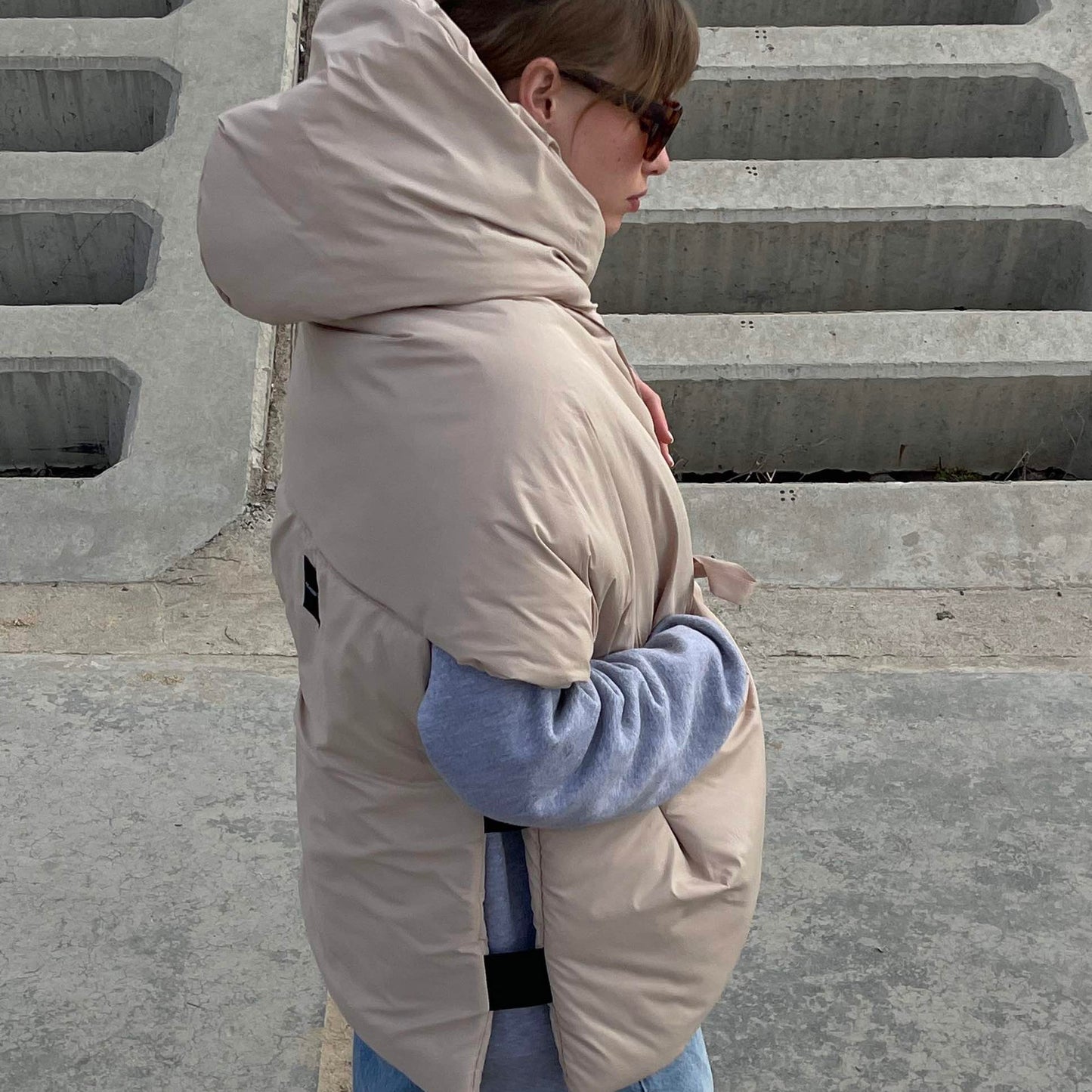 Beige Down vest with detachable hood
