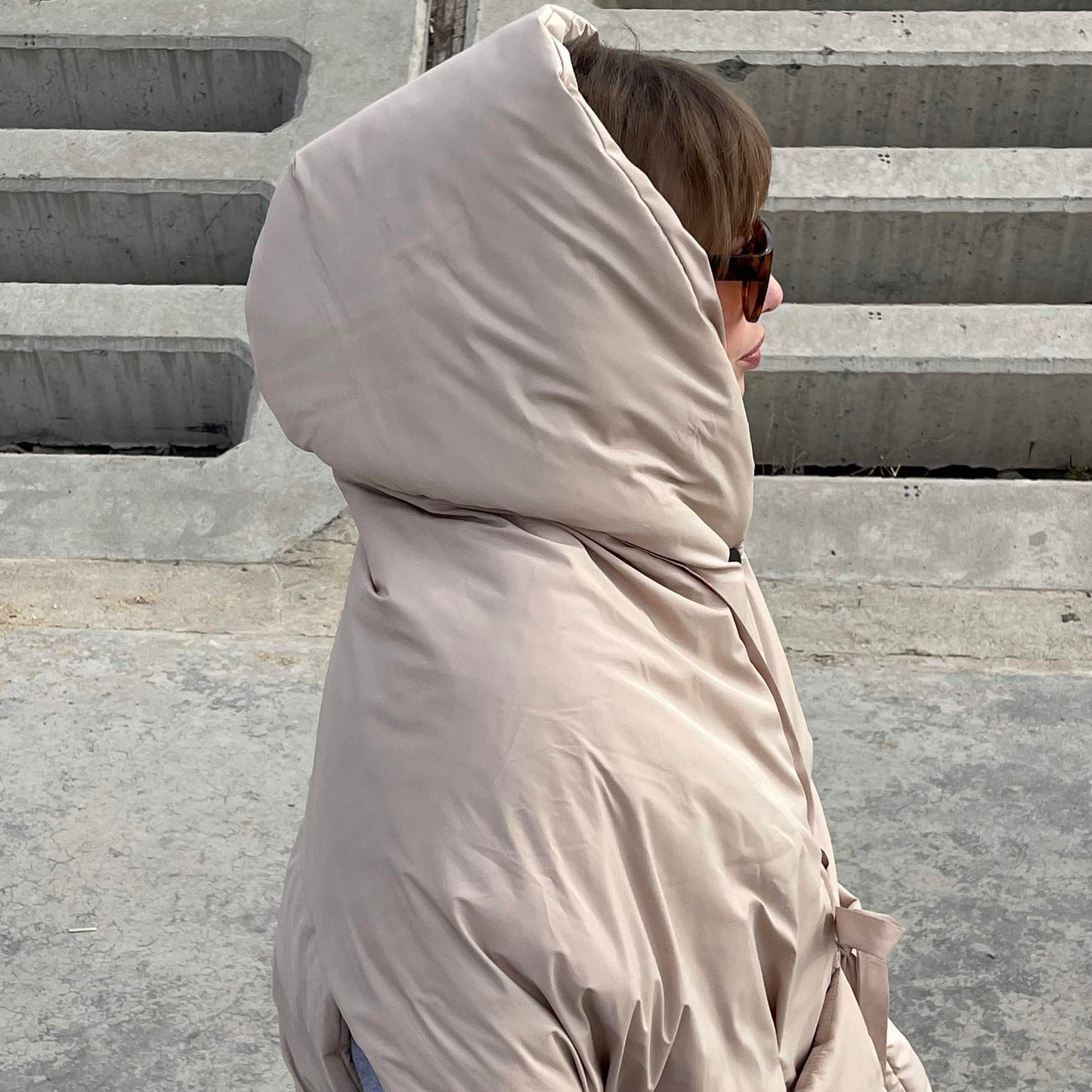 Beige Down vest with detachable hood