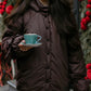 Down jacket in black with detachable chocolate and removable hood