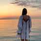 Short dress with ribbons in organic linen