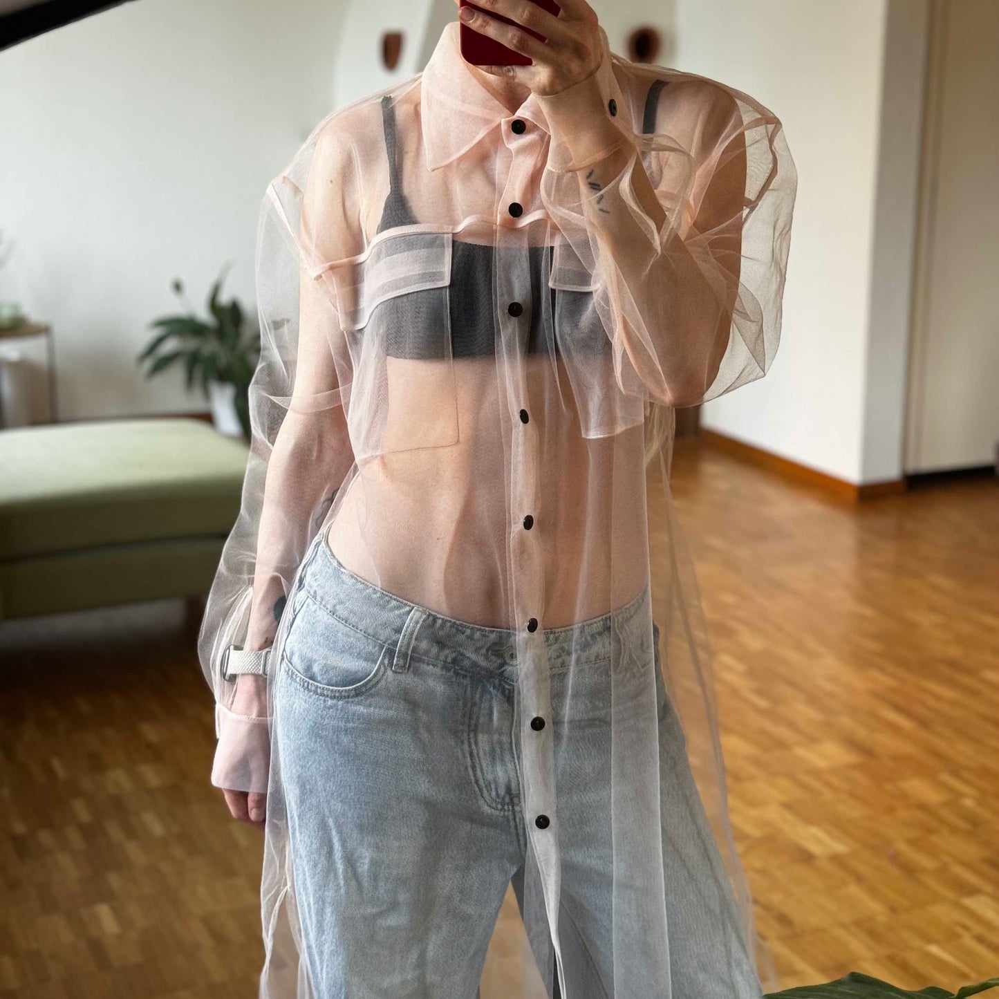 Elongated transparent beige shirt