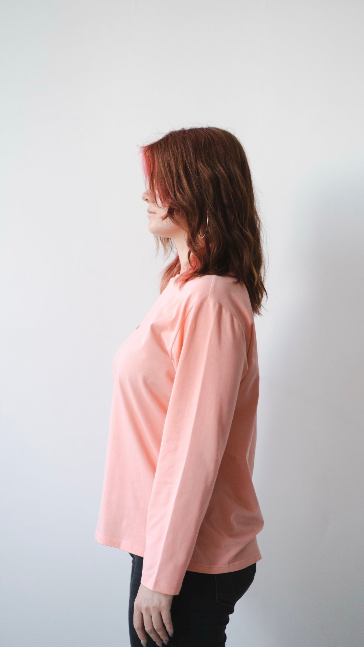 Longsleeve with a symbolic inscription «Human» peach