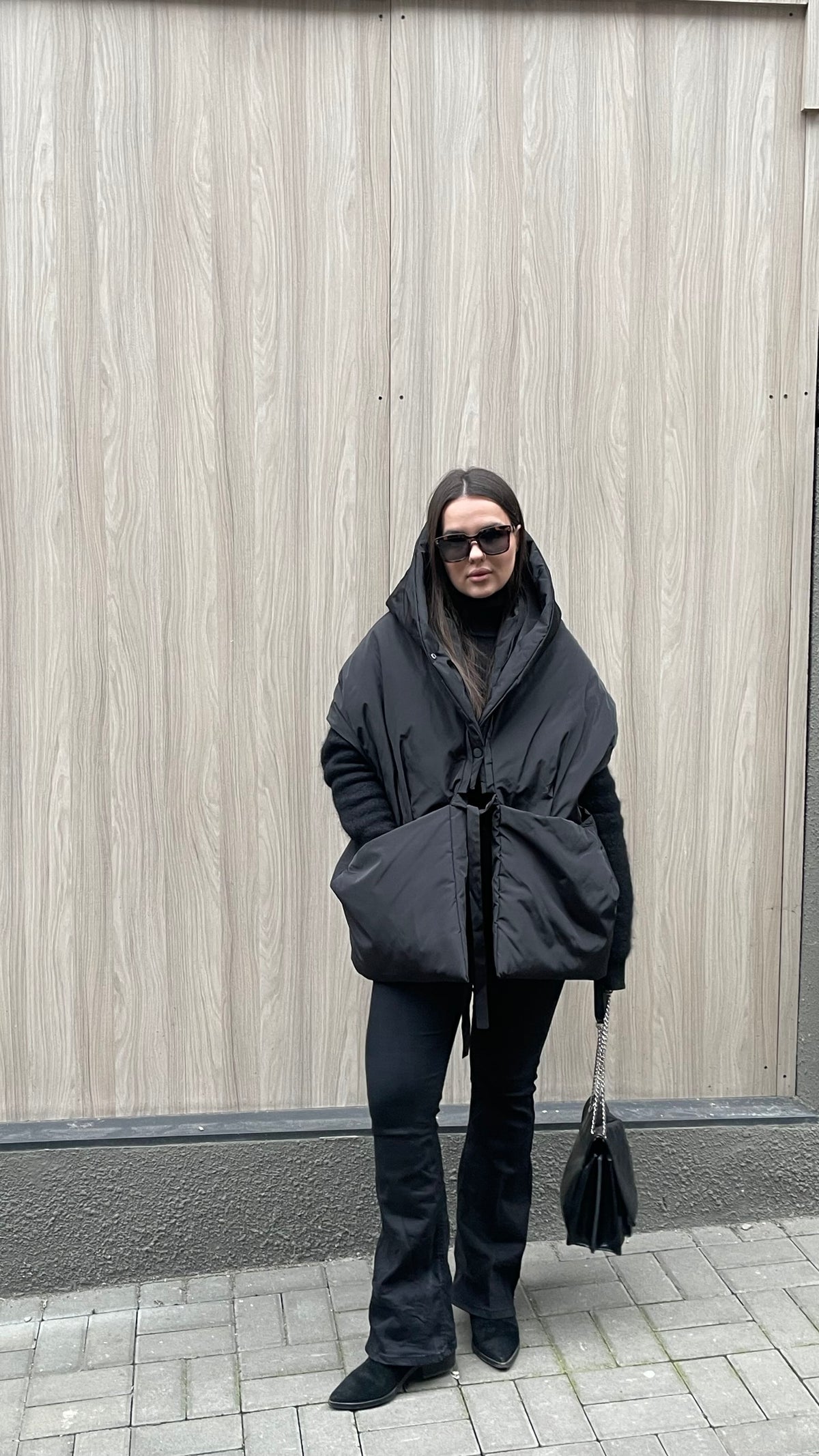 Black Down vest with detachable hood