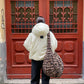 Down jacket  "Little duck" in yellow butter with detachable bows and removable hood