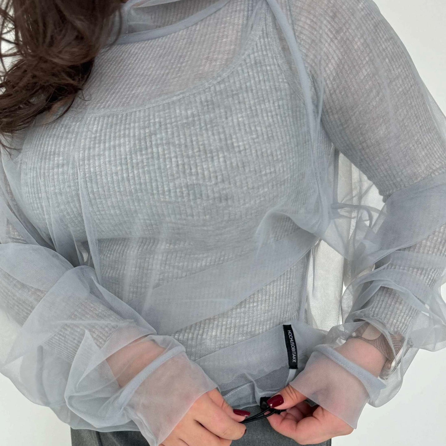 Transparent gray hoodie with an elastic band