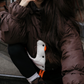 Down jacket  "Little duck" in chocolate with detachable bows and removable hood