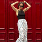 Pants with flounces a bird print