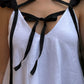Short dress with ribbons in organic linen