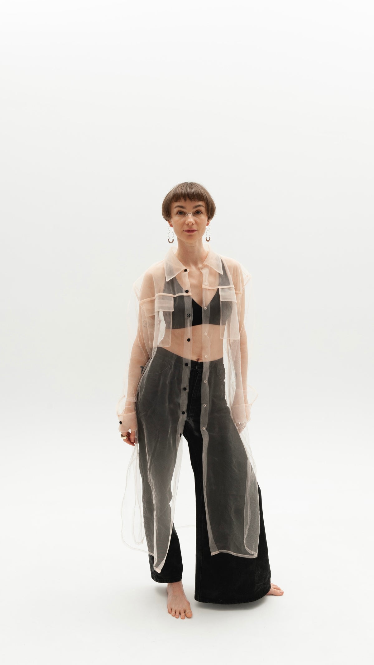Elongated transparent beige shirt