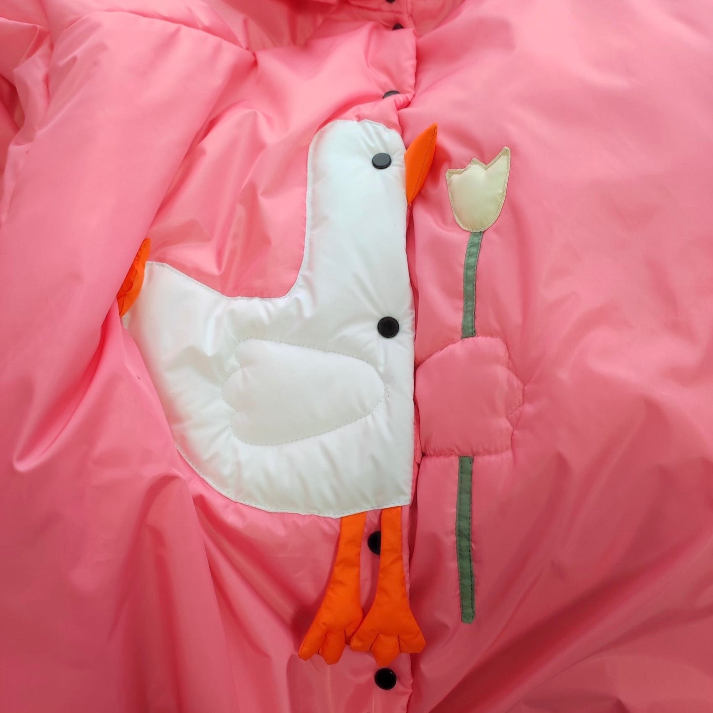Down jacket  "Little duck" in pink with detachable bows and removable hood