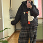 Down jacket  "Little duck" in black with detachable bows and removable hood