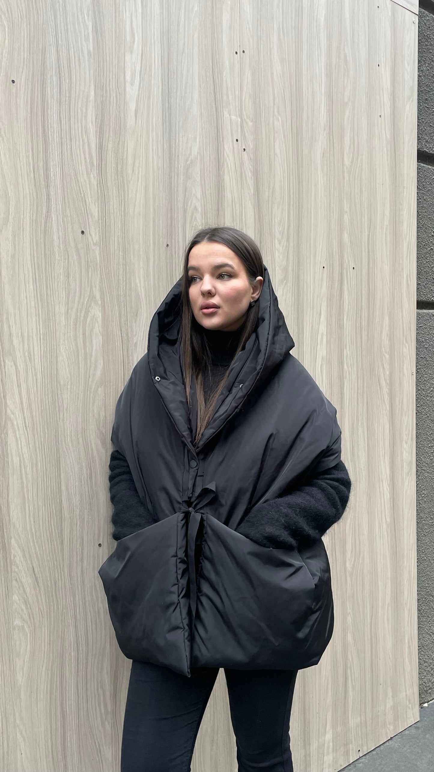Black Down vest with detachable hood