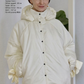 Down jacket in yellow butter with detachable powder and removable hood