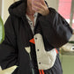 Down jacket  "Little duck" in black with detachable bows and removable hood